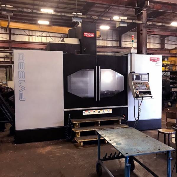 View inside Lange Grinding and Machining large CNC shop near Cleveland shows new FV1680 Toyoda Vertical Machining Center