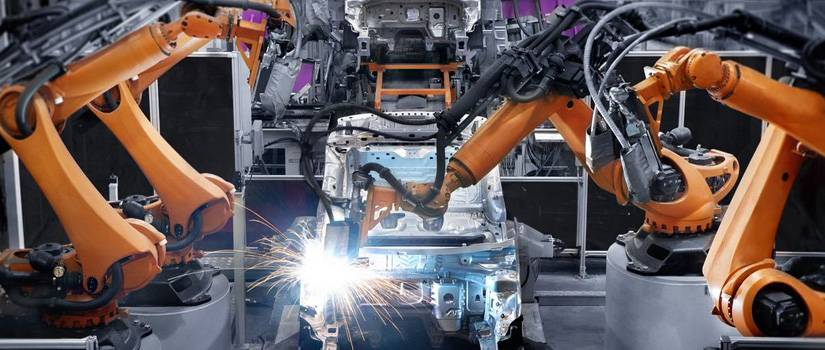 automotive robots in action run on custom machined parts by Lange Grinding and Machining in Northeast Ohio